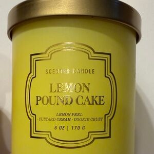 Kirklands Lemon Pound Cake Candle - Bright Yellow with Gold Lid